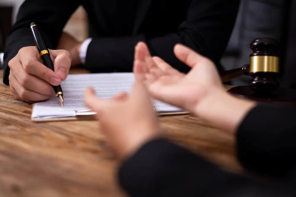 Mediation client meeting lawyer consulting government help, Businessman and Male lawyer or judge consult having team meeting with client, Law and Legal services concept.